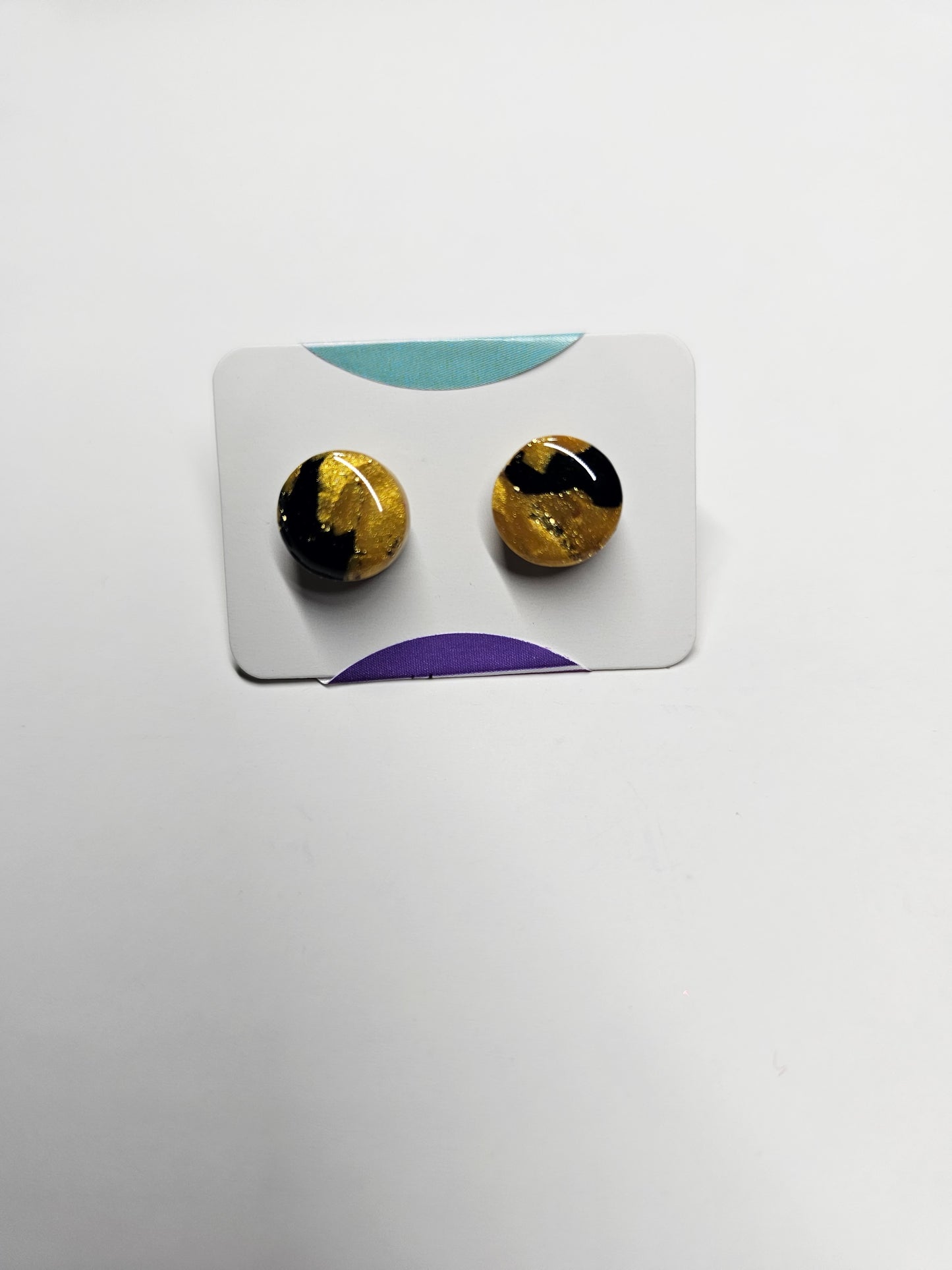 Gold and black dot stud earrings