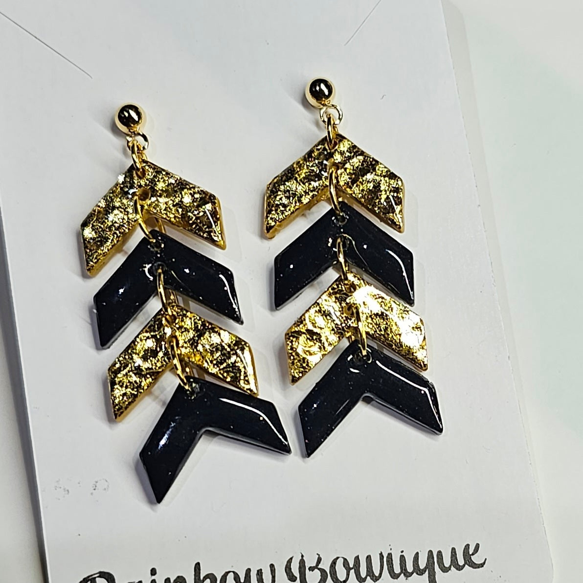 Arrow dangly earrings