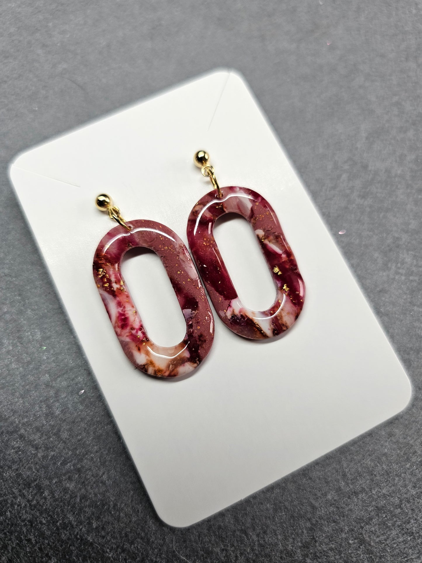 Burgundy oval hoop earrings