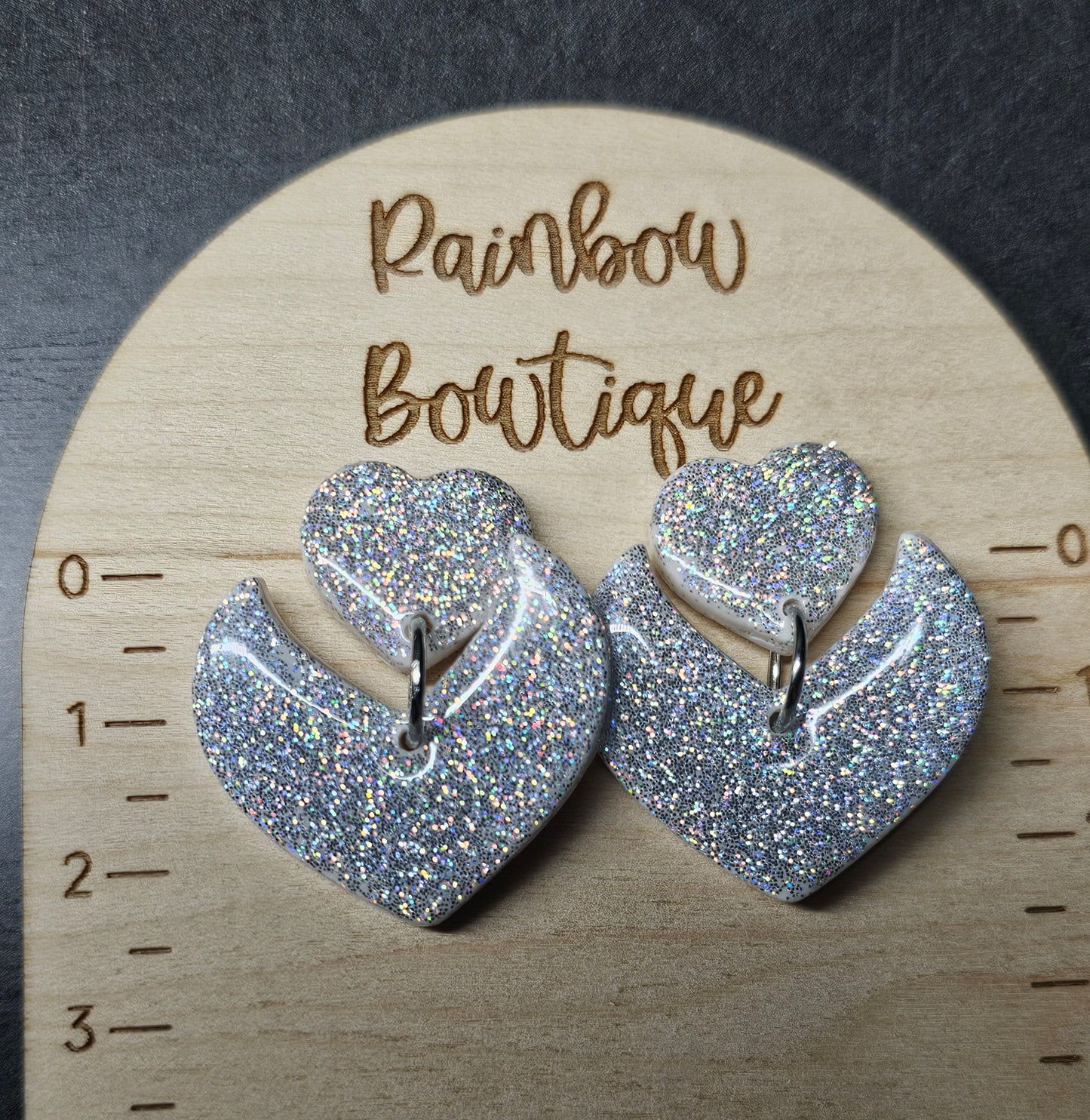 Silver holo dangly earrings