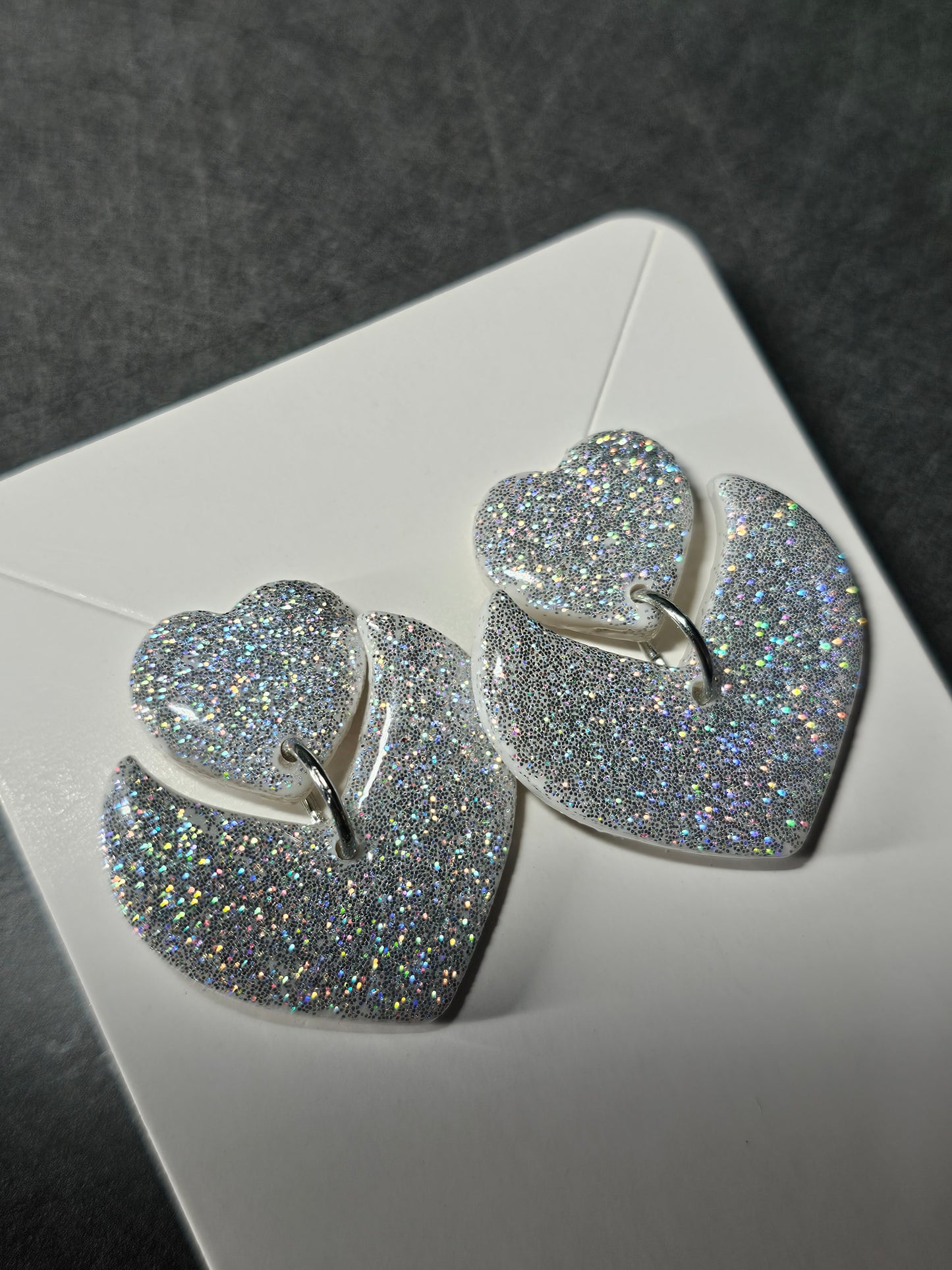 Silver holo dangly earrings