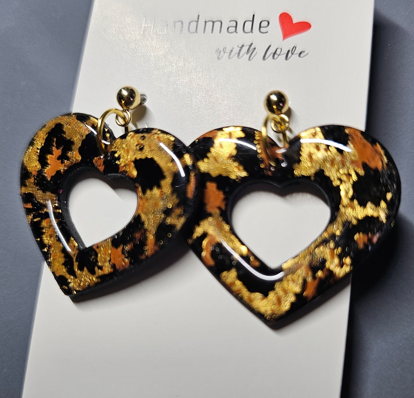 Leopard print heart earrings