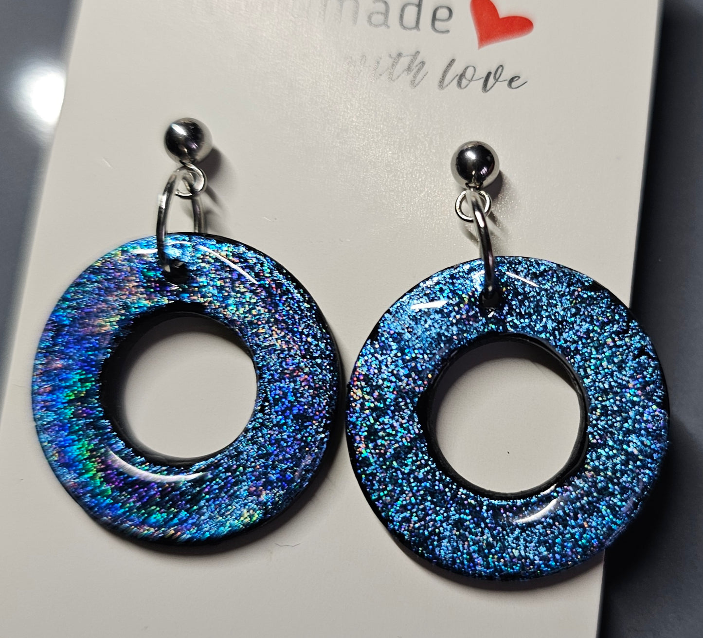 Blue holo donut shaped earrings