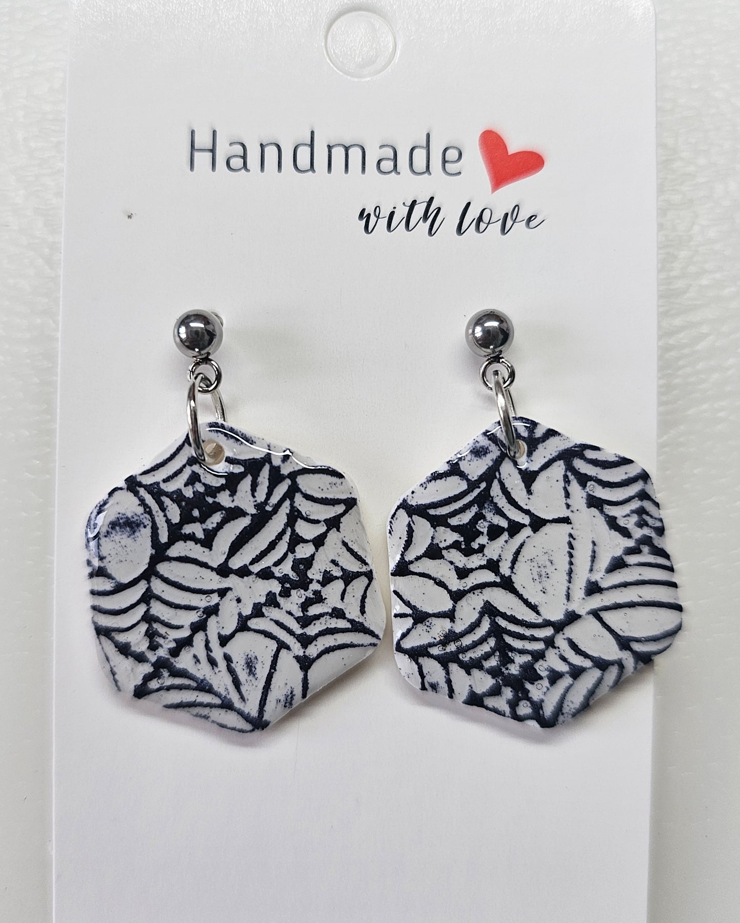 Web drop earrings