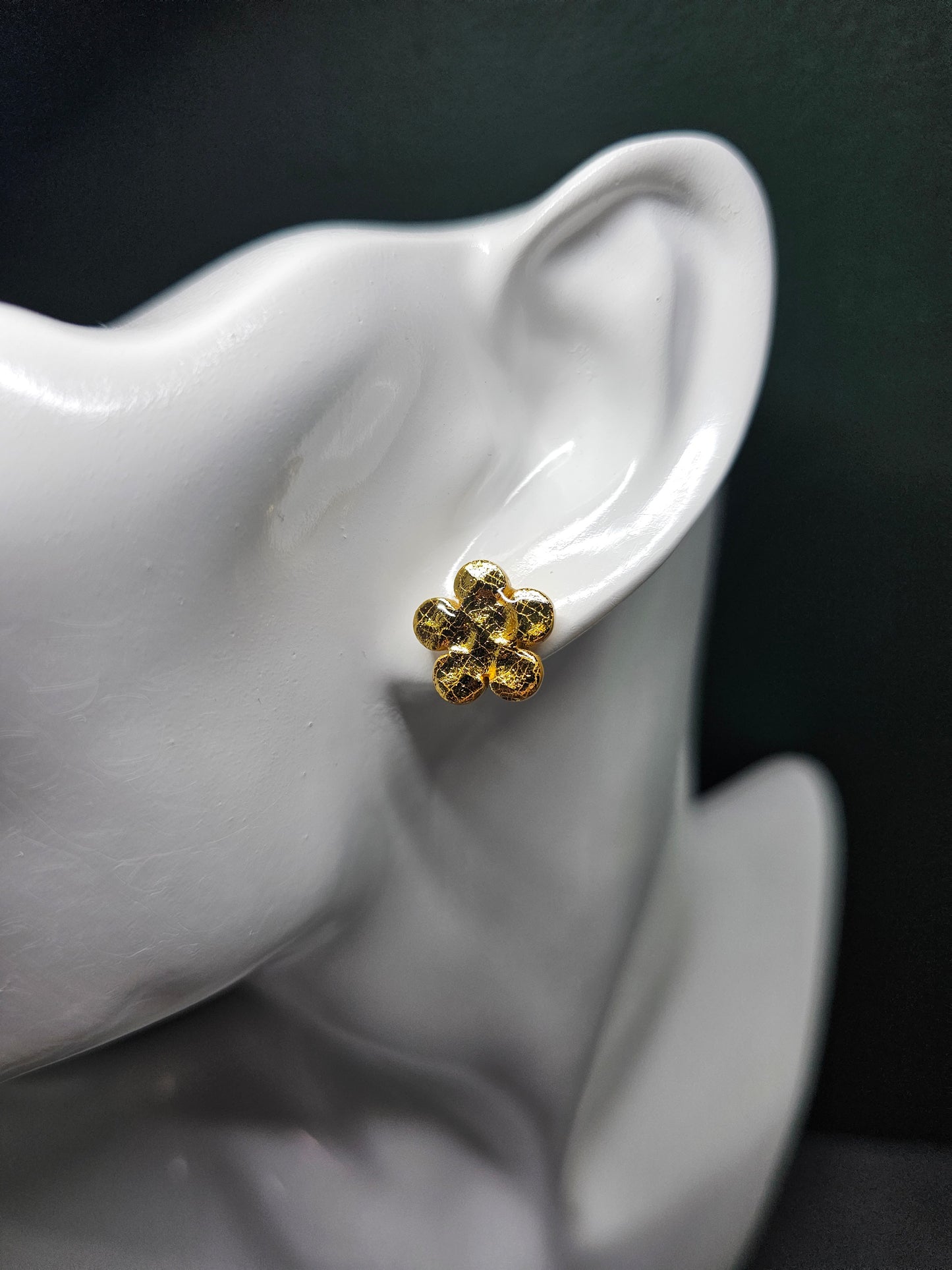 Gold hammered effect flower stud earrings