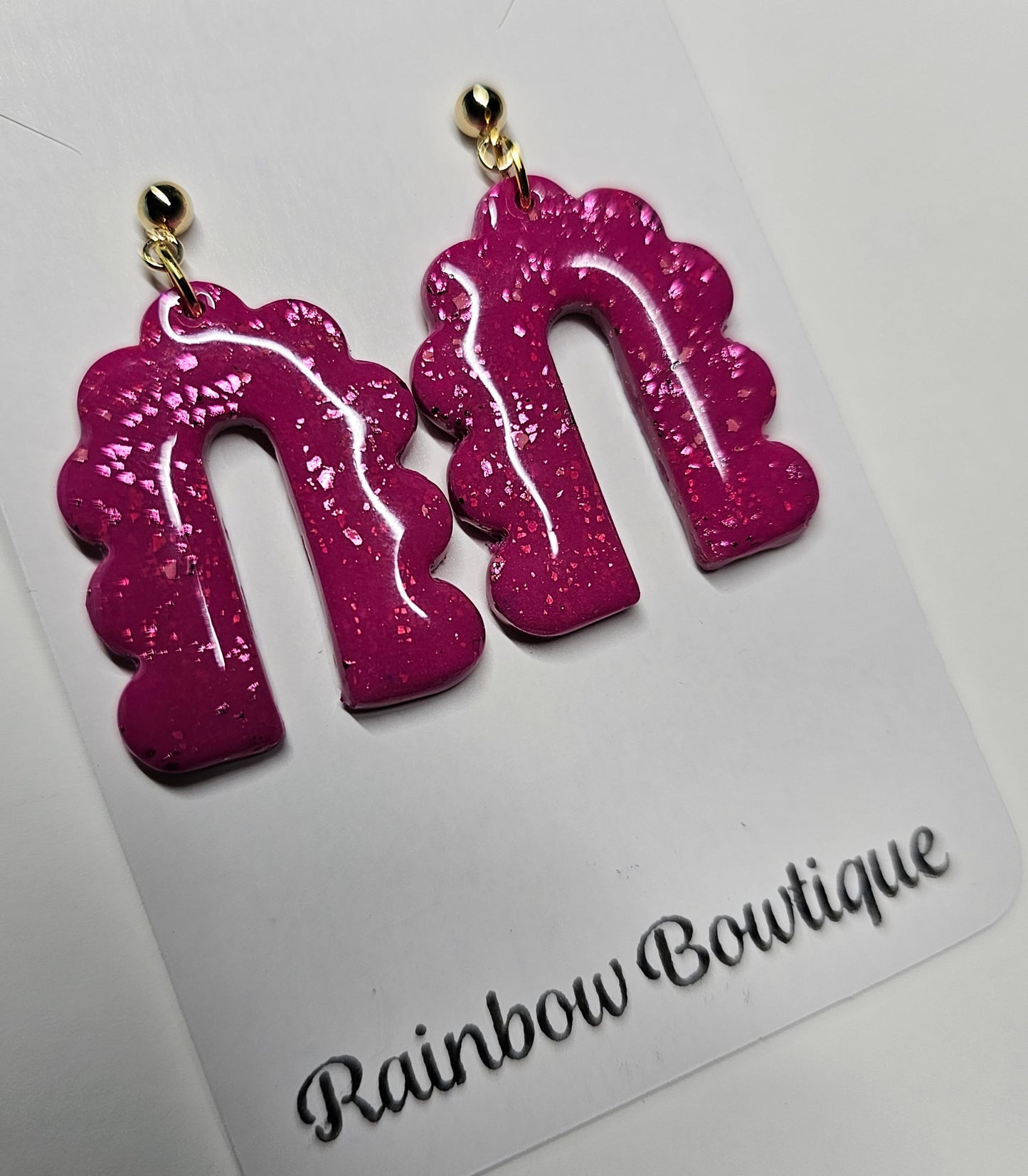 Pink curved arch earrings