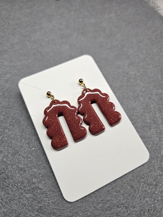 Curved arch burgundy earrings