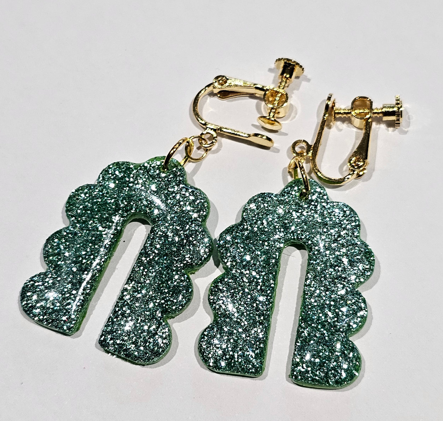 Clip on mint glitter arch earrings