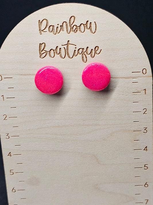 Bright pink dot studs