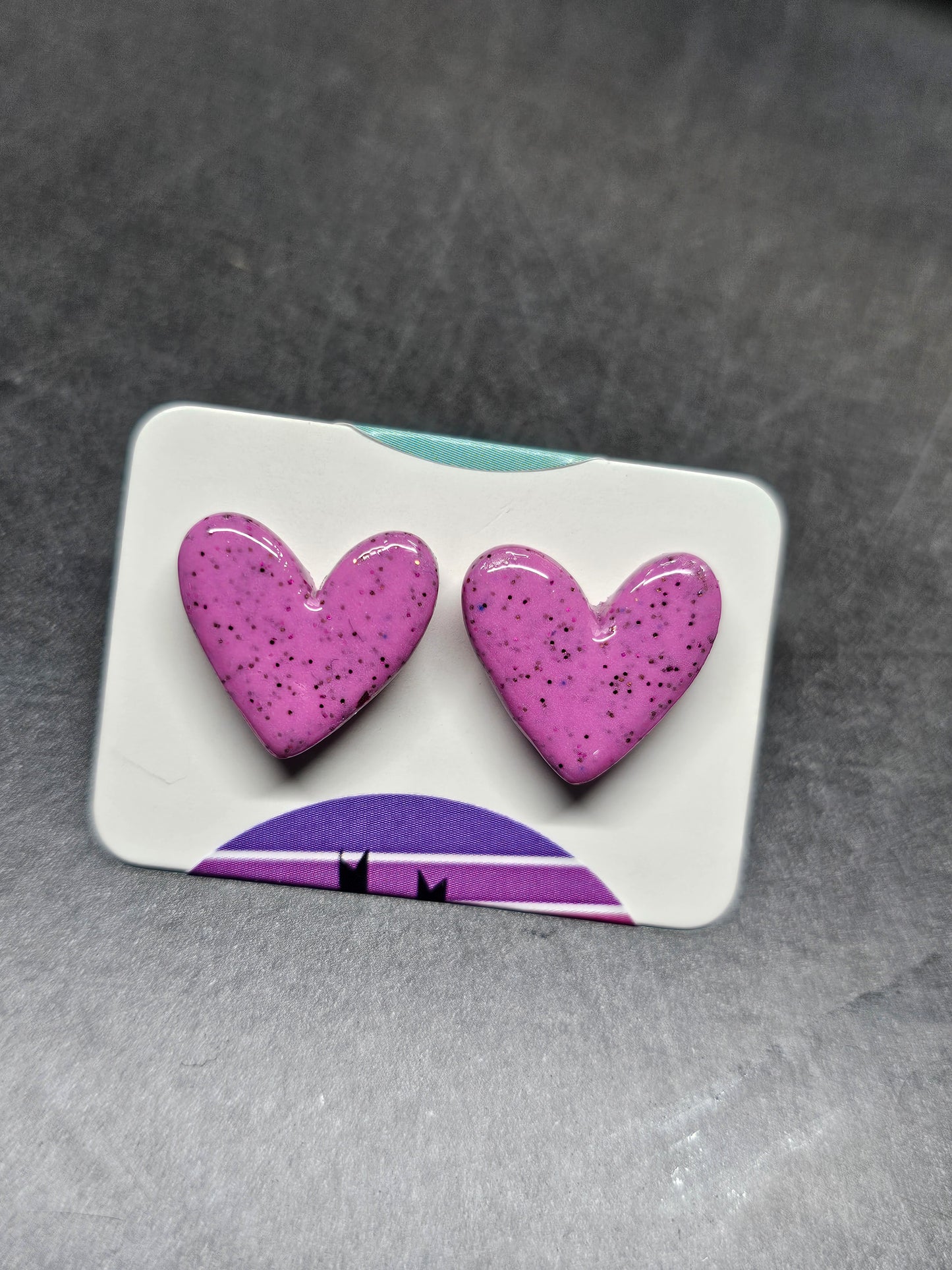 Pink glitter heart studs