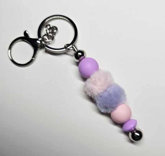 Purple pom pom keyring