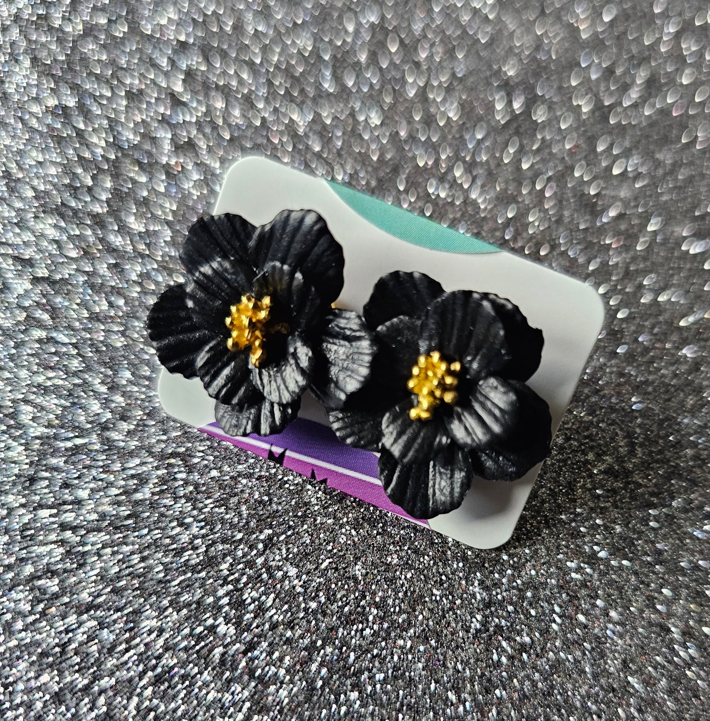 Black flower stud earrings