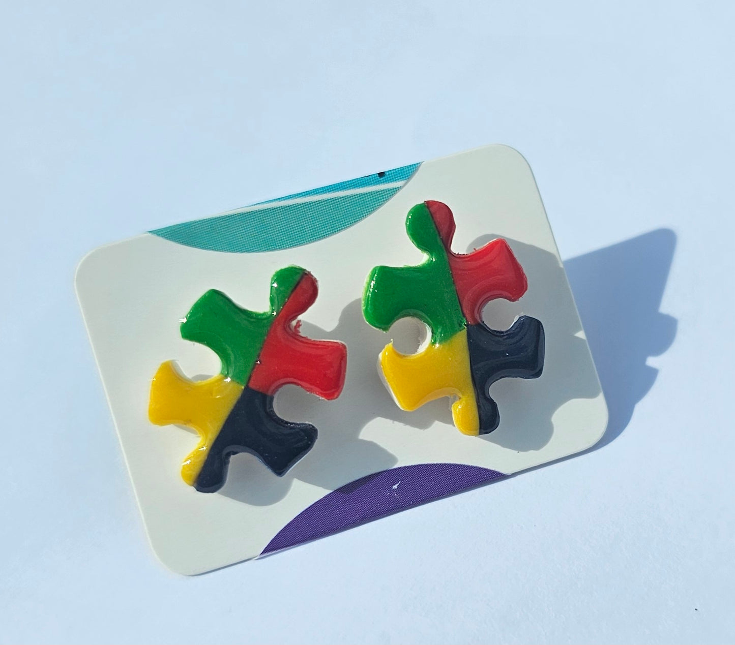 Puzzle piece autism awareness stud earrings
