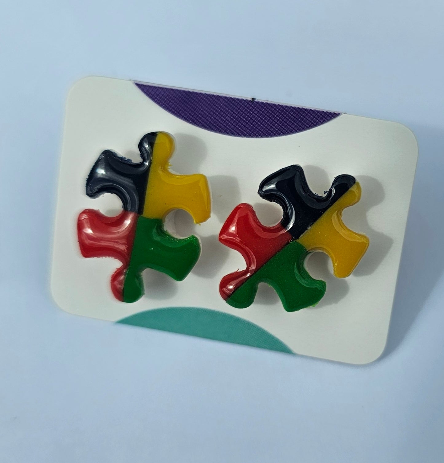 Puzzle piece autism awareness stud earrings