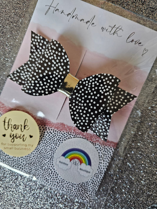 Black with white dots hair bow