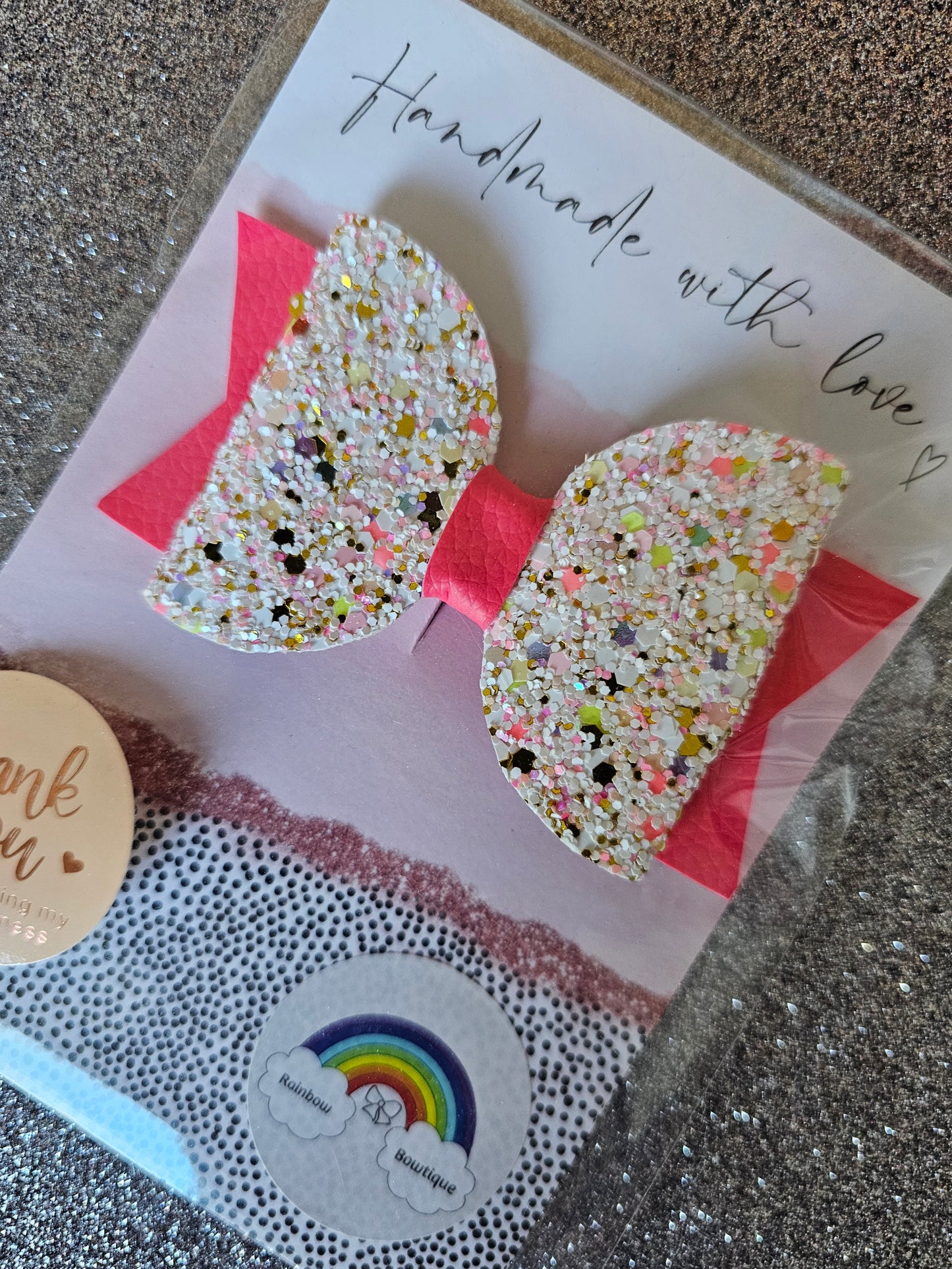 Pink and yellow glitter bow