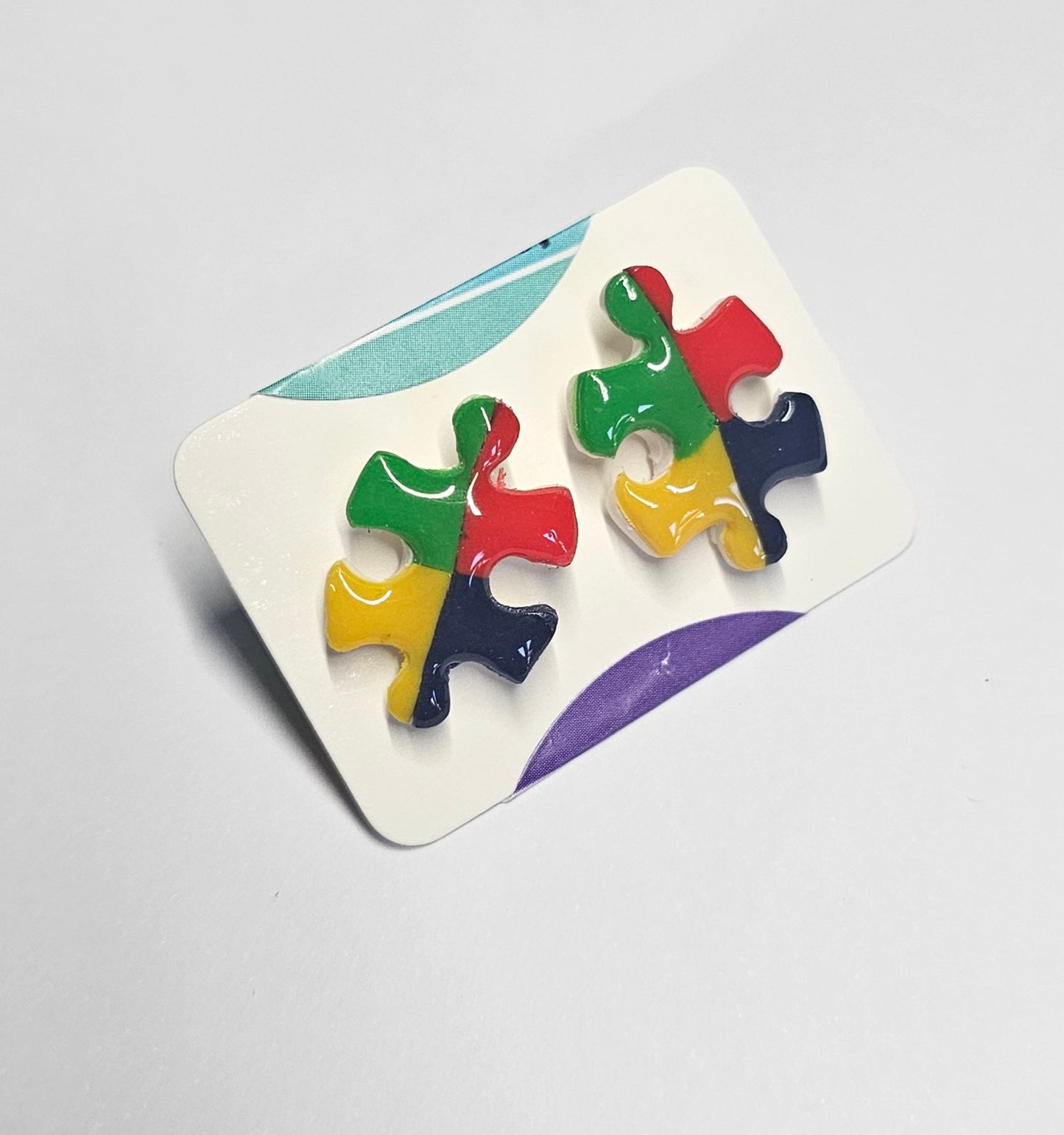 Puzzle piece autism awareness stud earrings